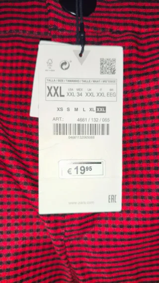 Pantalones elásticos Zara a cuadros rojos y negros