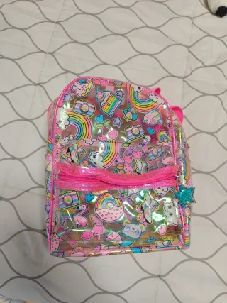 Mochila transparente con brillos y dibujos