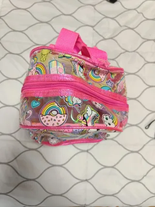 Mochila transparente con brillos y dibujos