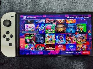 Nintendo Switch OLED Bianca + 55 Giochi