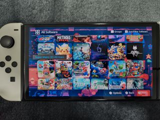 Nintendo Switch OLED Bianca + 55 Giochi