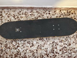 Skate Nomad con diseño de pantera