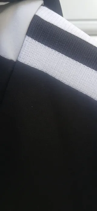 Giacca a vento Adidas nera con cappuccio nuova