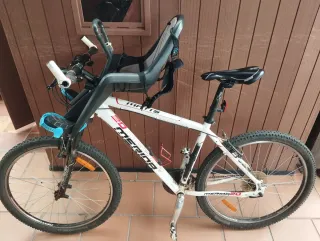 Bicicleta Mérida 26 con silla infantil