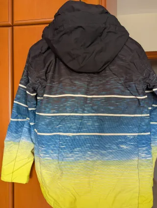 Chaqueta Quiksilver azul y amarilla, talla 16.