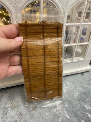 Tende in miniatura per casa delle bambole