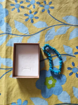 Bracciale celeste con farfalla