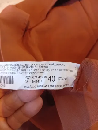 Falda marrón plisada