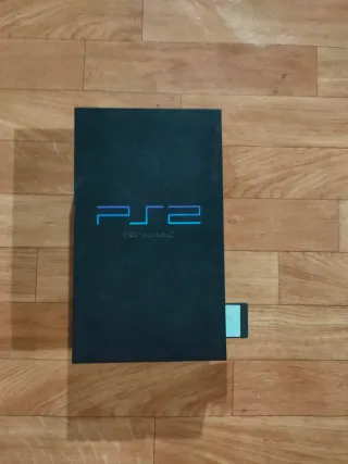 PlayStation 2 + Volante Logitech MOMO