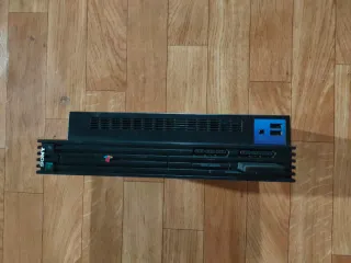 PlayStation 2 + Volante Logitech MOMO