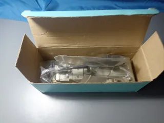 Pinza para botón  de anillas