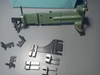 Pinza para botón  de anillas