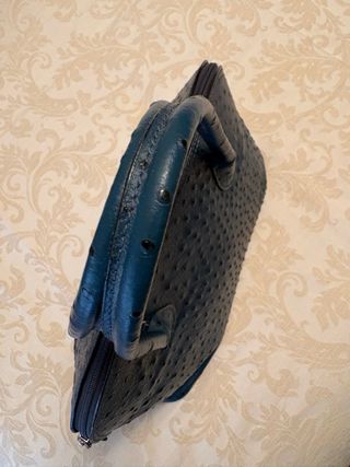 Bolso de mano azul efecto piel