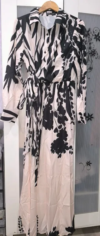 Mono elegante estampado blanco y negro