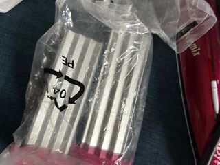 Plancha de pelo BaByliss con accesorios