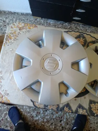 Tapacubos Suzuki Swift 15 originales