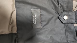 Chaquetón negro con cinturón