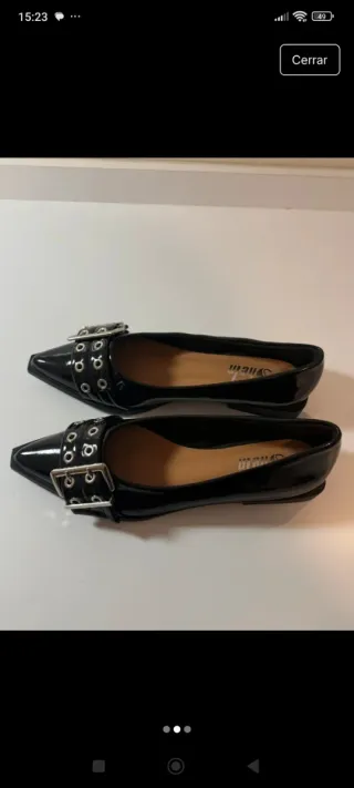 Zapatos planos negros con hebilla