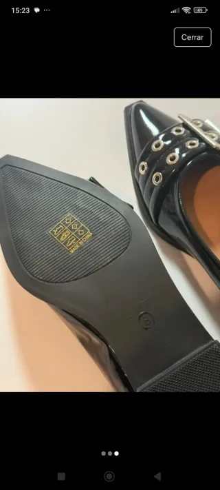 Zapatos planos negros con hebilla