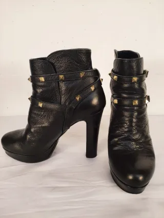 Stivaletti neri tacco 12 con borchie