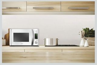 Microondas Candy X-Range CMXG20DW con Grill