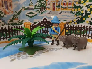 Playmobil figura y 2 cerdos