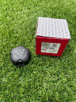 Tappo radiatore con simbolo