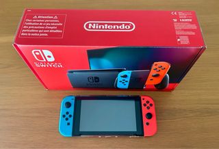 Nintendo Switch + FIFA 23 Legacy Edition + Extras