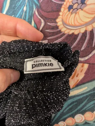 Top fiesta brillante negro y plateado