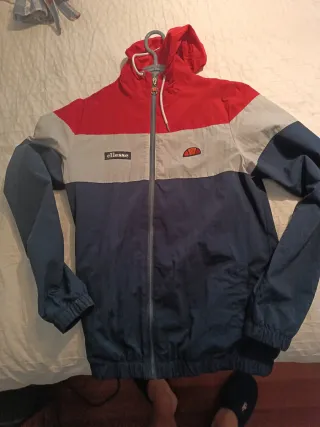 Chubasquero Ellesse Rojo, Azul y Gris