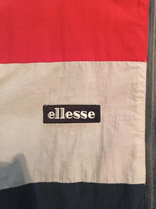 Chubasquero Ellesse Rojo, Azul y Gris