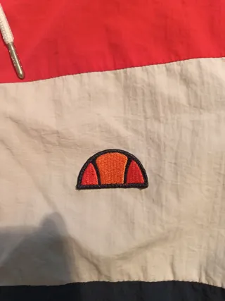 Chubasquero Ellesse Rojo, Azul y Gris