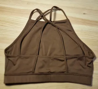 Top deportivo Puma espalda cruzada marrón