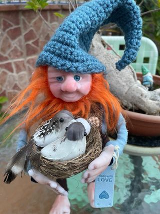 Gnomo di porcellana fredda con nido