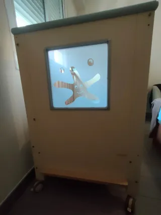 Cuna de madera con ruedas de la marca MICUNA