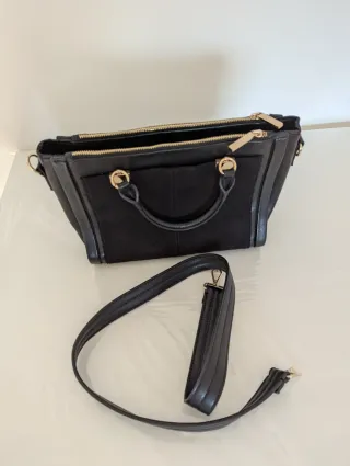 Bolso negro mano o bandolera