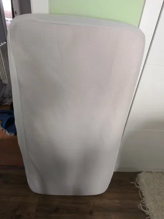 colchón y protector impermeable