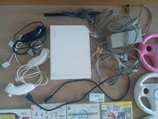 Consola Wii + accessori e giochi