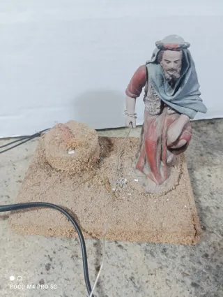 Figura movimiento pescador