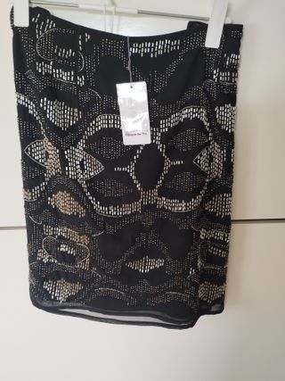 Falda fiesta negra con pedrería plateada