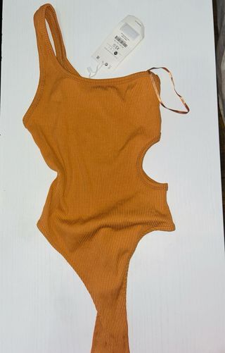 Body naranja con aberturas Talla XS