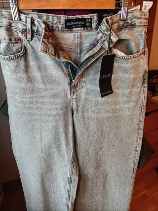 Pantalón vaquero ancho Stradivarius gris T.38
