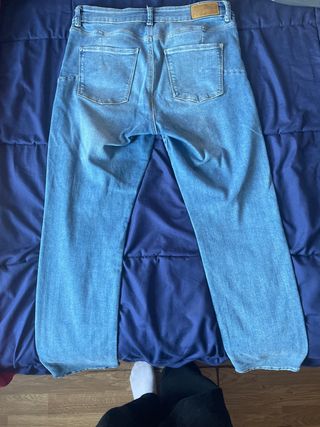 Pantalones vaqueros negros blanco azul y turquesa