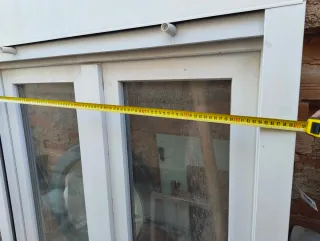 Ventana abatible con persiana