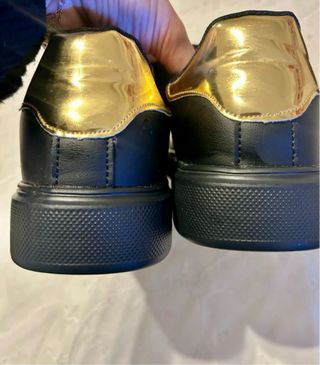 Scarpe unisex nere e oro