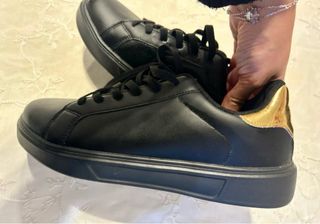 Scarpe unisex nere e oro