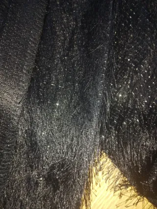 Chaqueta negra con detalles brillantes