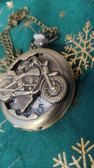 Orologio da tasca vintage con moto