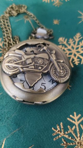 Orologio da tasca vintage con moto