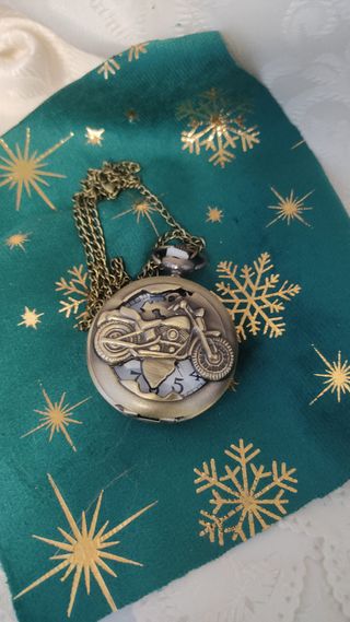 Orologio da tasca vintage con moto